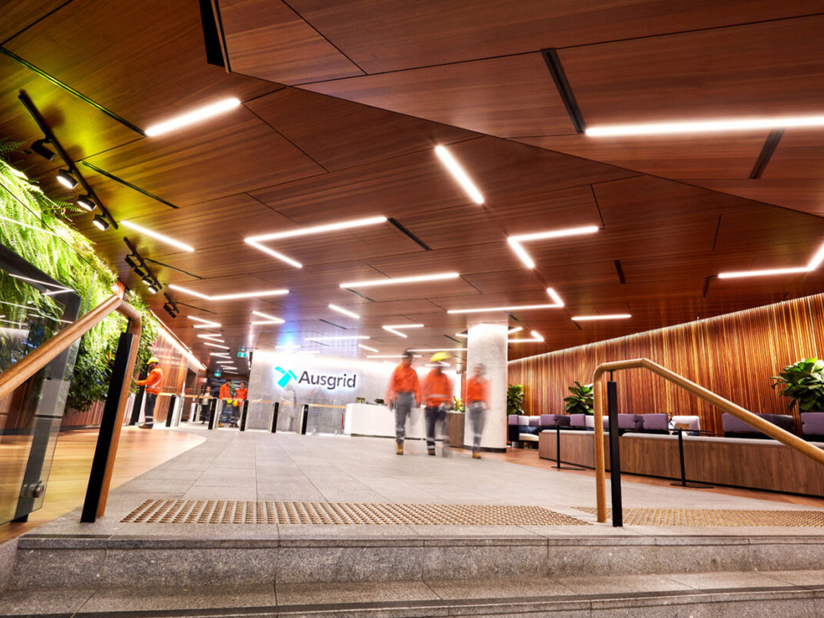 Sustainability Report homepage image of Ausgrid field crews in Head office foyer