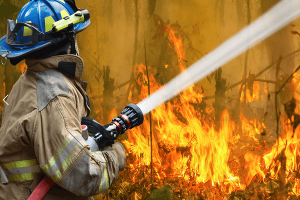 Fire fighter with water hose